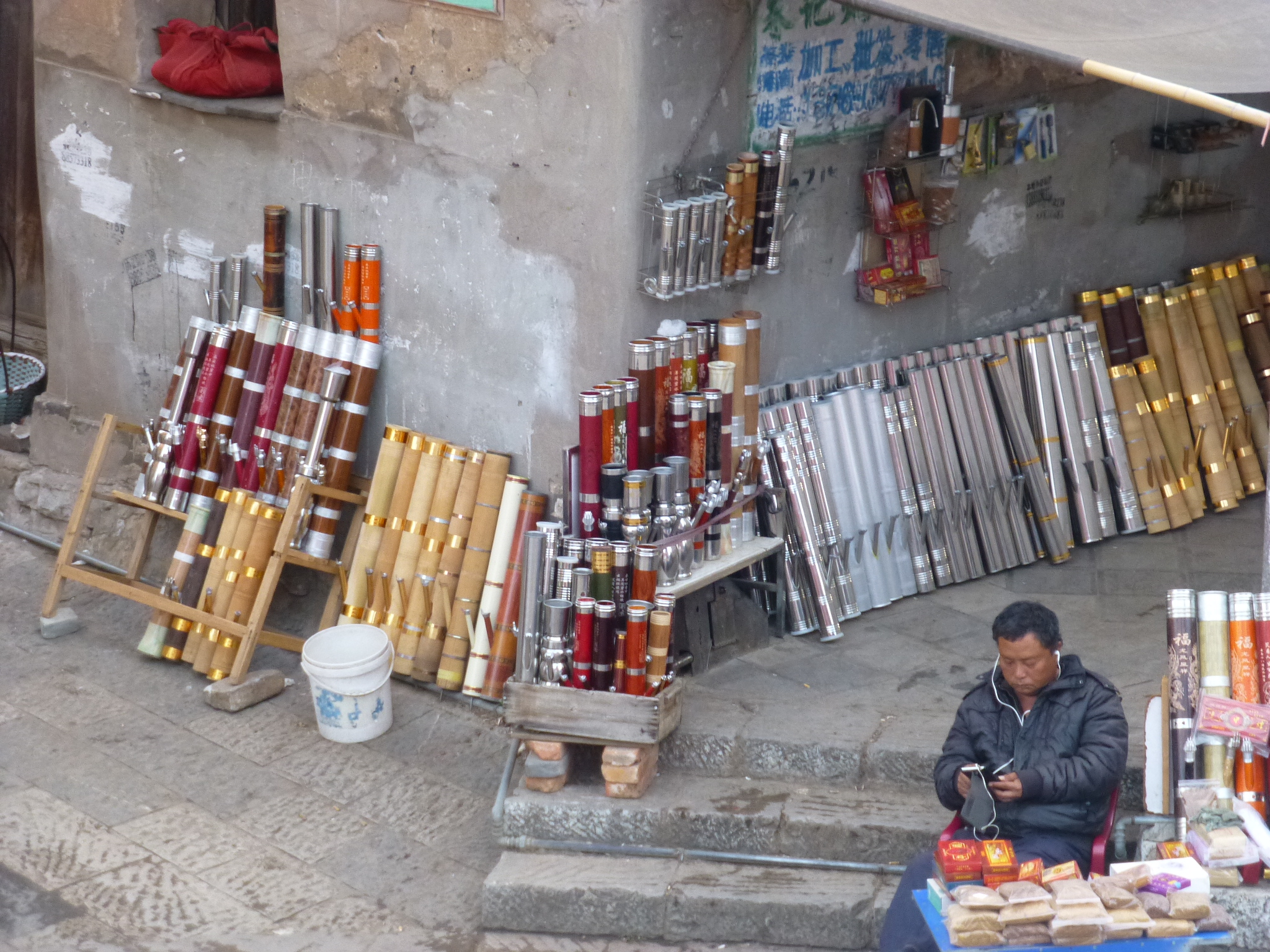 Bamboo pipes displayed by a vendor in Jianshui old town, Yunnan